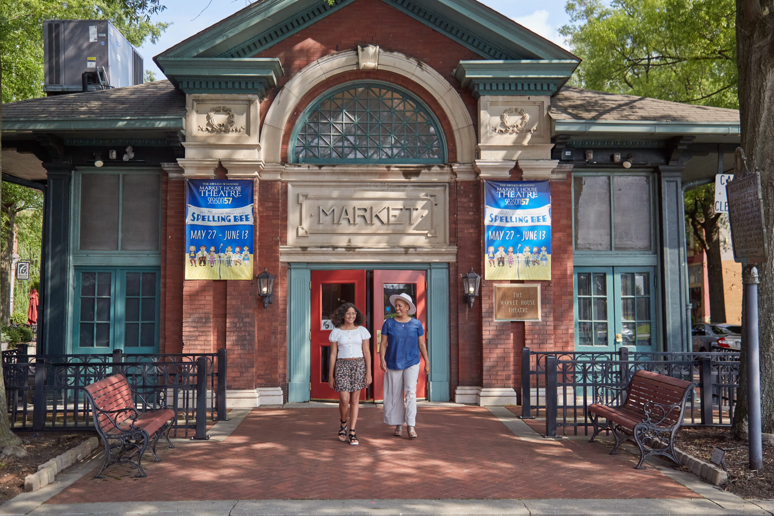 2 women exit the Paducah tourism center 